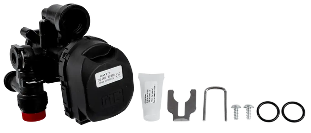 Wolf Hydraulik-Vorlaufblock mit Heizwasser und 3-Wegeventil, inklusive Montagezubehör wie Dichtungen, Schrauben und Montagewerkzeug.